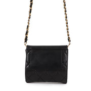 Buy an authentic Chanel Black Lambskin Leather Mini Classic Flap Bag in very good condition at Labellov in Antwerp.