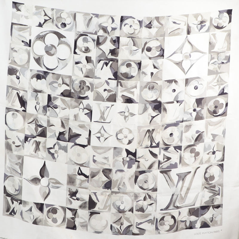 Buy an authentic second hand Louis Vuitton Grey Silk Monogram Scarf in good condition at Labellov Antwerp.