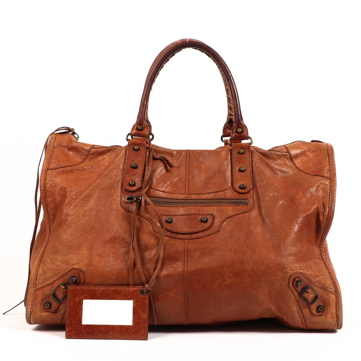 Balenciaga Cognac Leather Weekender Bag. Buy authentic secondhand Balenciaga bags at Labellov vintage webshop for the lowest price. Koop authentieke tweedehands Balenciaga tassen bij Labellov vintage webshop aan de laagste prijs.