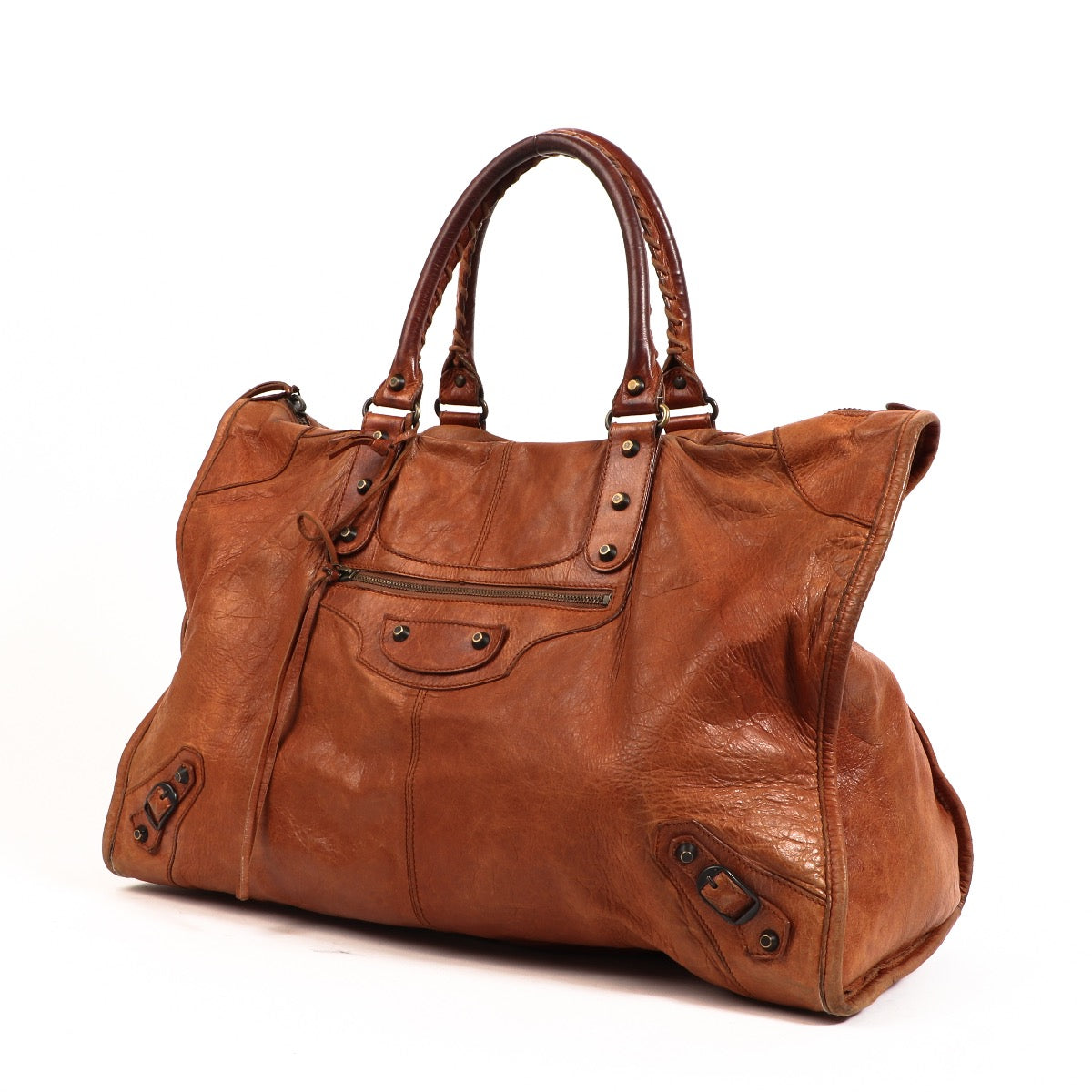Balenciaga Cognac Leather Weekender Bag. Buy authentic secondhand Balenciaga bags at Labellov vintage webshop for the lowest price. Koop authentieke tweedehands Balenciaga tassen bij Labellov vintage webshop aan de laagste prijs.