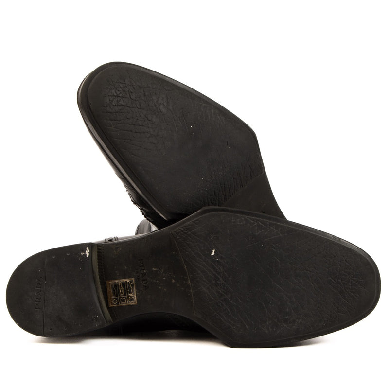 Buy 100% authentic Prada Black Ankle Chelsea Boots in Size 37 on LabelLov.com