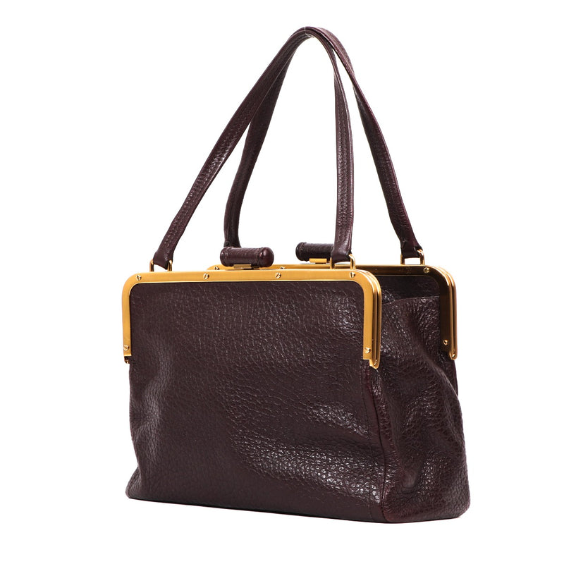 Buy an authentic second-hand Prada Burgundy Leather Shoulder Bag in very good condition at Labellov in Antwerp.