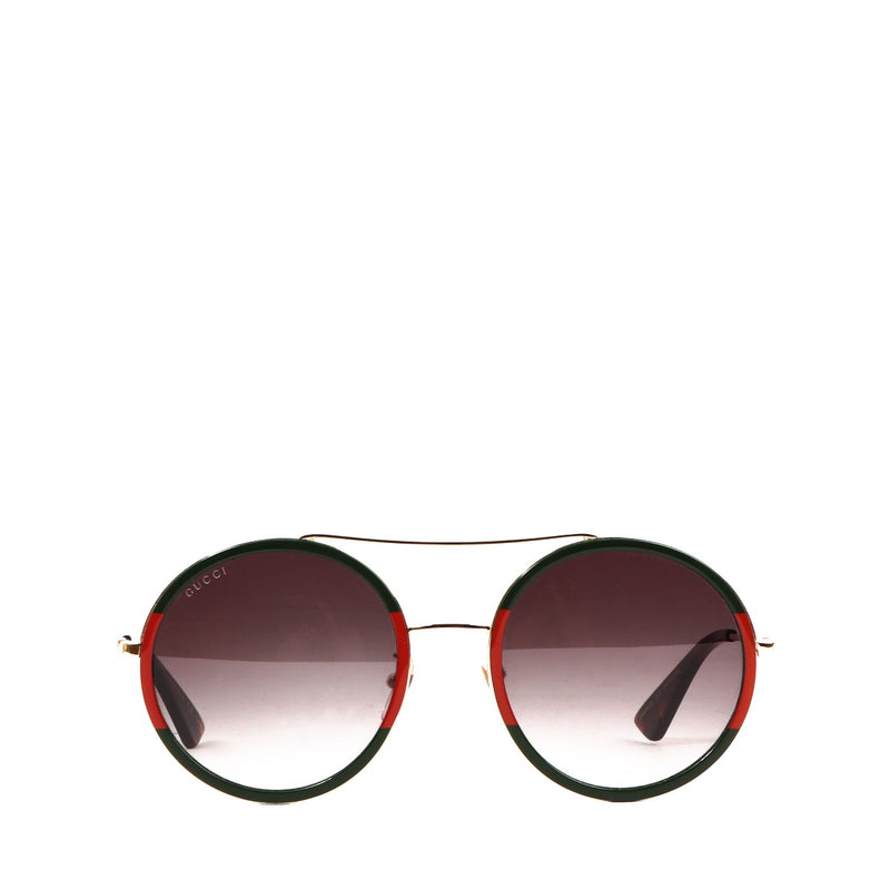 Buy an authentic pair of second hand Gucci Red/ Green GG0061Round Sunglasses in very good condition at Labellov
