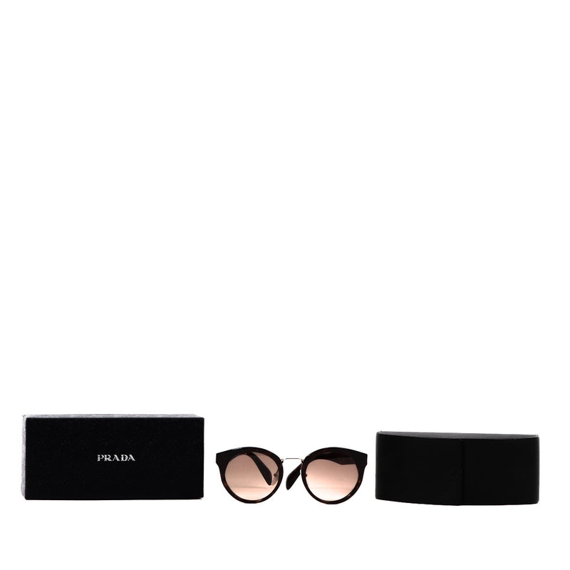 Buy an authentic pair of second hand Prada Round Brown Sunglasses in very good condition at Labellov