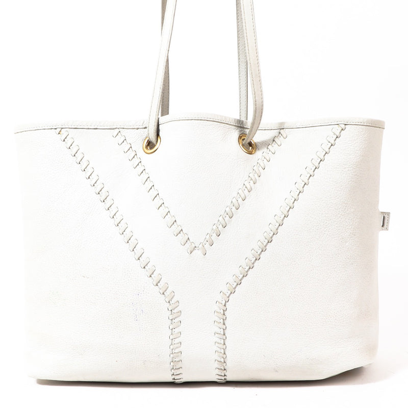 Buy an authentic Yves Saint Laurent White Leather Reversible Tote Bag in preloved condition at Labellov in Antwerp.