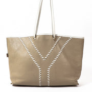 Buy an authentic Yves Saint Laurent White Leather Reversible Tote Bag in preloved condition at Labellov in Antwerp.
