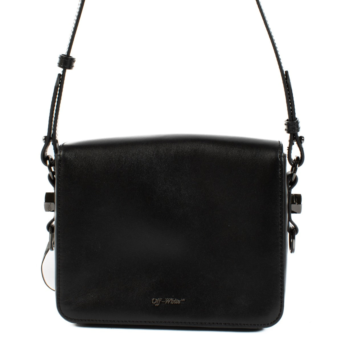 Black leather shoulder bag with cotton flower print, Off-White cut-out strap, 'SCULPTURE' text print, magnetic closure, and binder clip detail at the front. Includes one black shoulder strap. Shop now on Labellov.com.