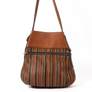Buy an authentic Delvaux Multicolor Toile De Cuir Shoulder Bag in good condition at Labellov in Antwerp.
