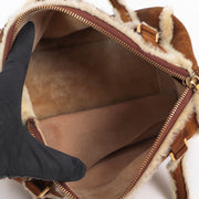 Buy an authentic second hand Delvaux Cognac Mouton Retourné Astrid MM Bag in very good condition at Labellov