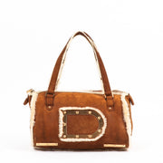 Buy an authentic second hand Delvaux Cognac Mouton Retourné Astrid MM Bag in very good condition at Labellov