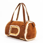Buy an authentic second hand Delvaux Cognac Mouton Retourné Astrid MM Bag in very good condition at Labellov
