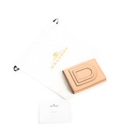Buy an authentic second hand Delvaux Nude Leather Small Le Louise Wallet in very good condition.