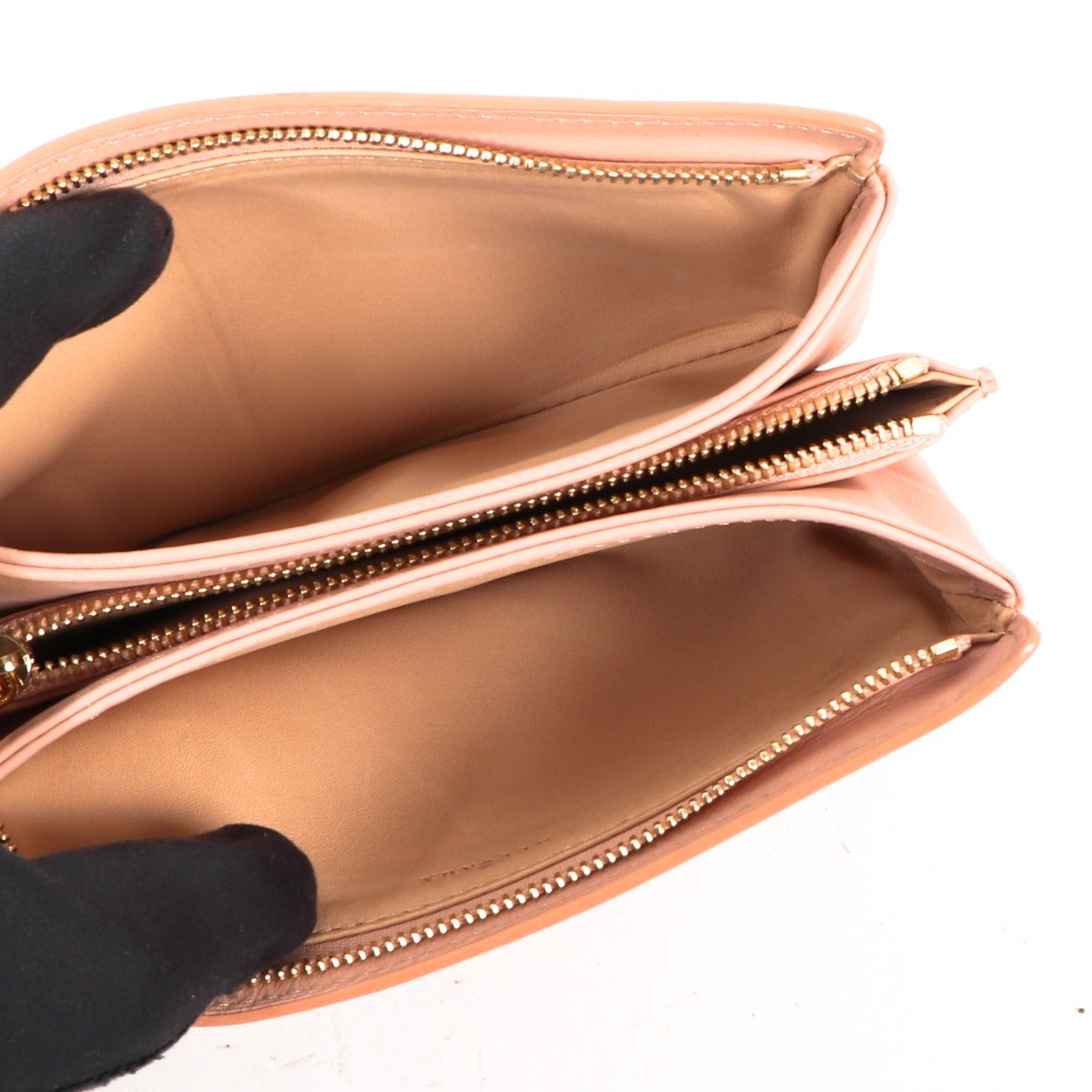 Buy an authentic second-hand Delvaux Pink Leather Pouch in very good condition at Labellov in Antwerp.