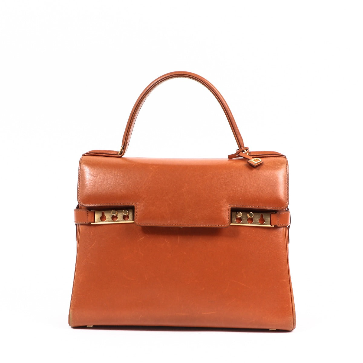 Buy an authentic second-hand Delvaux Cognac Tempête Box Calf Top Handle MM Bag in very good condition at Labellov in Antwerp.