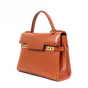 Buy an authentic second-hand Delvaux Cognac Tempête Box Calf Top Handle MM Bag in very good condition at Labellov in Antwerp.