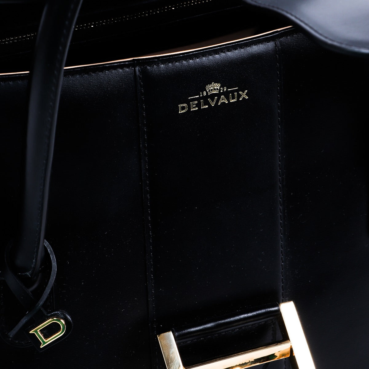 Buy an authentic second-hand Delvaux Black Box Calf Double Poignée Brillant Top Handle Bag in very good condition at Labellov in Antwerp.