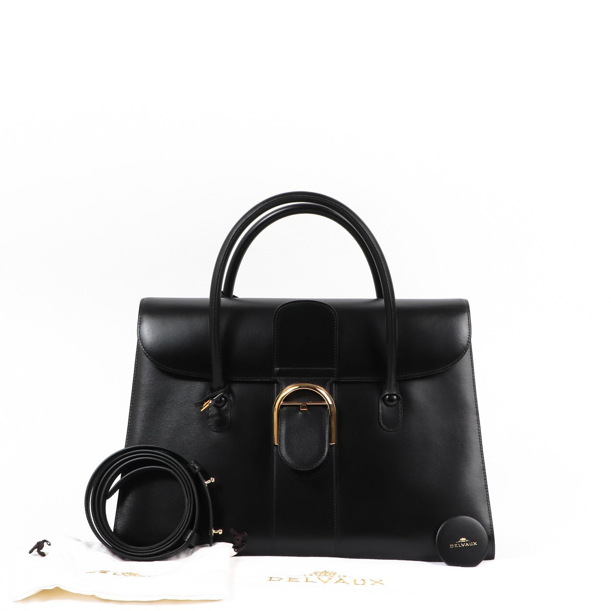 Buy an authentic second-hand Delvaux Black Box Calf Double Poignée Brillant Top Handle Bag in very good condition at Labellov in Antwerp.