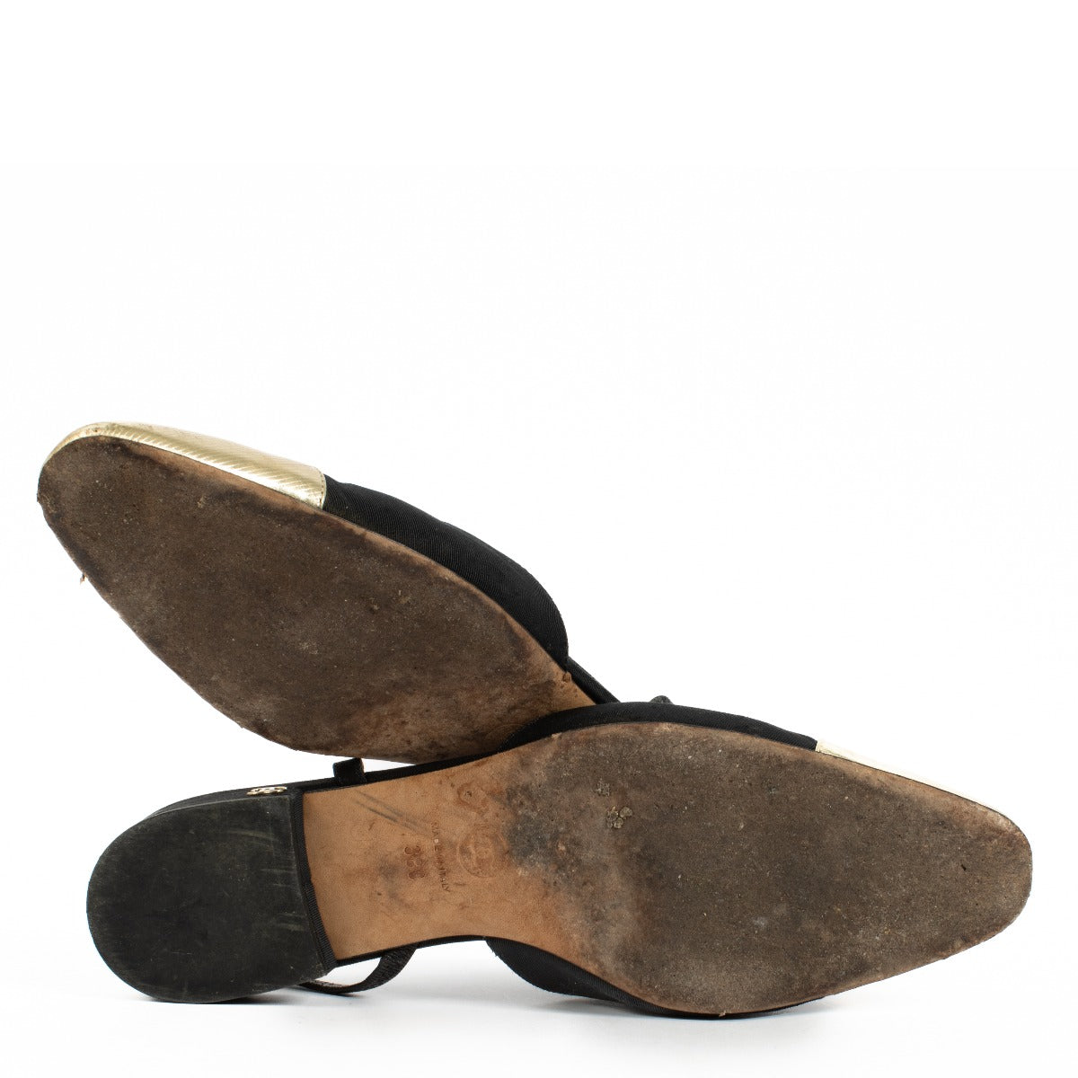 Chanel Gold/Black Slingbacks in size 38, featuring a gold-toned body, classic black toe caps, and an adjustable slingback strap for a chic and versatile look. Shop now on Labellov.com.