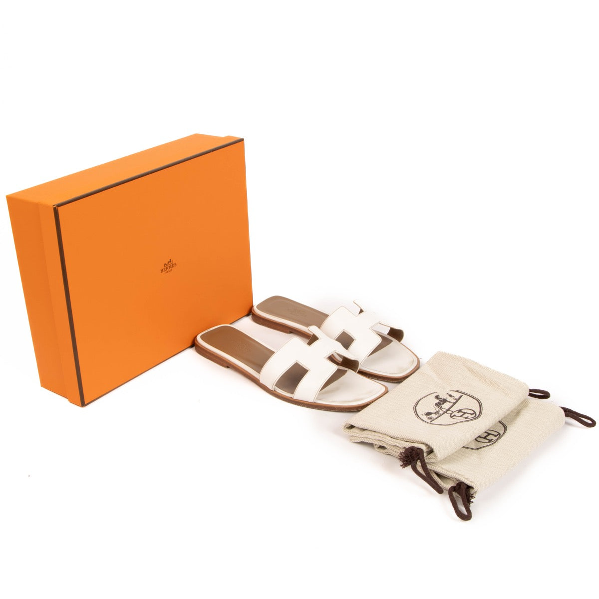 Hermès Black Oran Sandals - size 38 for the best price at Labellov secondhand luxury in Antwerp.