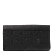 Shop an authentic preloved Louis Vuitton Black Monogram Empreinte Leather Sarah Wallet on Labellov.com