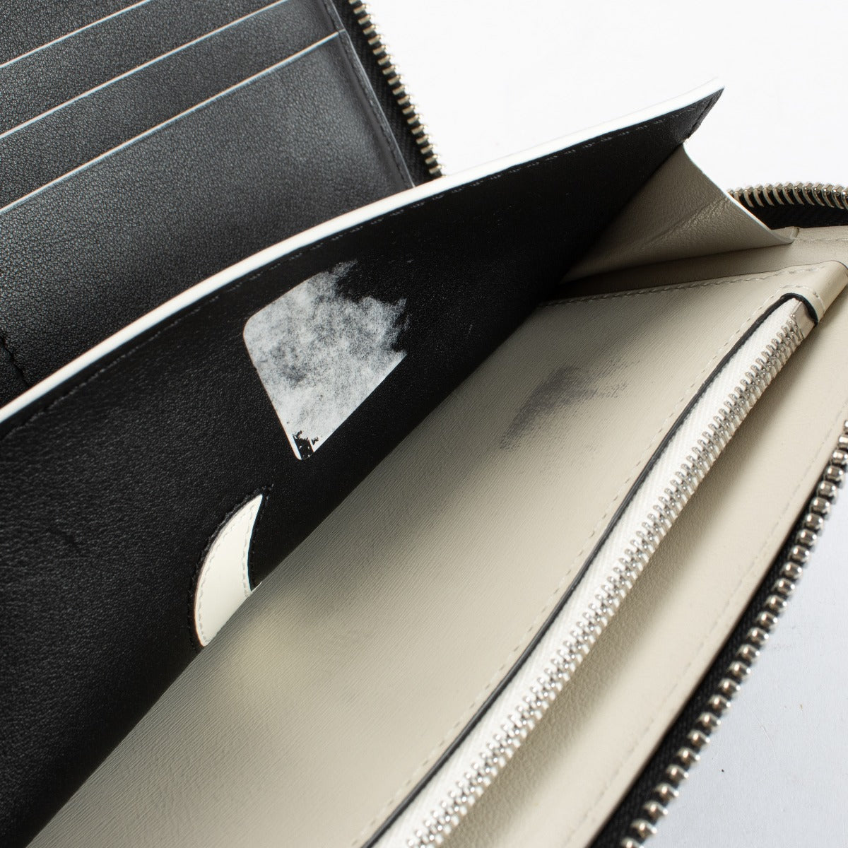 Delvaux Black Bowler Hat smooth leather zip wallet with iconic motif at Labellov.com