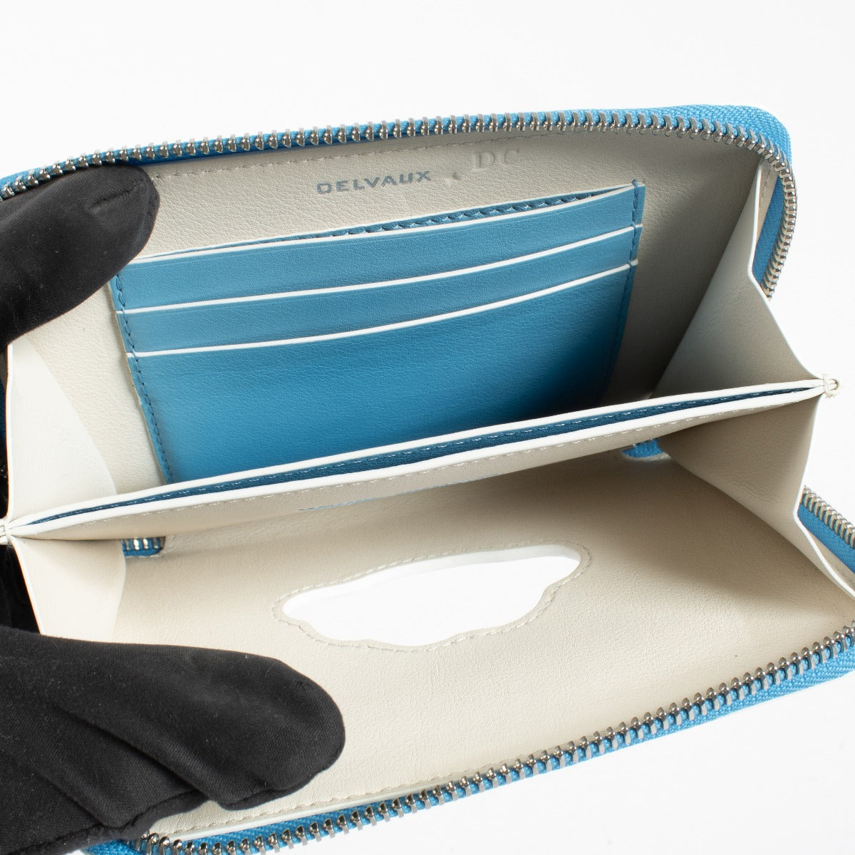Delvaux Blue Trompe l’Oeil smooth leather zip wallet with iconic motif at Labellov.com