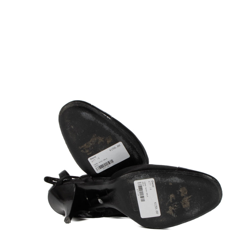 shop 100% authentic second hand Chanel 04P Black Strap Heels - size 39 1/2 on Labellov.com