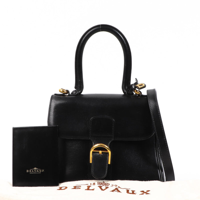 Buy this authentic second-hand vintage Delvaux Black Mini Brillant Bag at online webshop LabelLOV. Safe and secure shopping. Koop deze authentieke tweedehands vintage Delvaux Black Mini Brillant Bag bij online webshop LabelLOV.