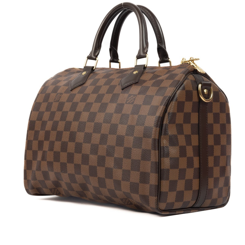 Buy an authentic second hand Louis Vuitton Damier Ebene Canvas Speedy Bandoulière 30 Bag in new condition at Labellov