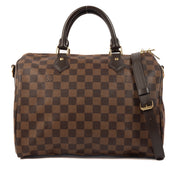 Buy an authentic second hand Louis Vuitton Damier Ebene Canvas Speedy Bandoulière 30 Bag in new condition at Labellov