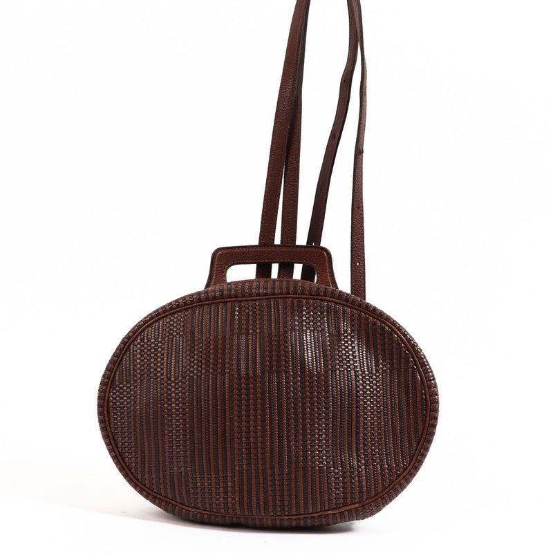Buy an authentic second-hand Delvaux Brown Toile de Cuir backpack in very good condition at Labellov in Antwerp.