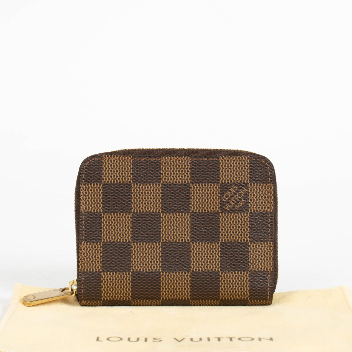 Authentic pre-loved Louis Vuitton Damier Ebene Zippy Coin Purse on Labellov.com