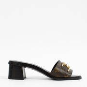 shop 100% authentic second hand Louis Vuitton Monogram Lock It Mule Sandals - Size 39 on Labellov.com