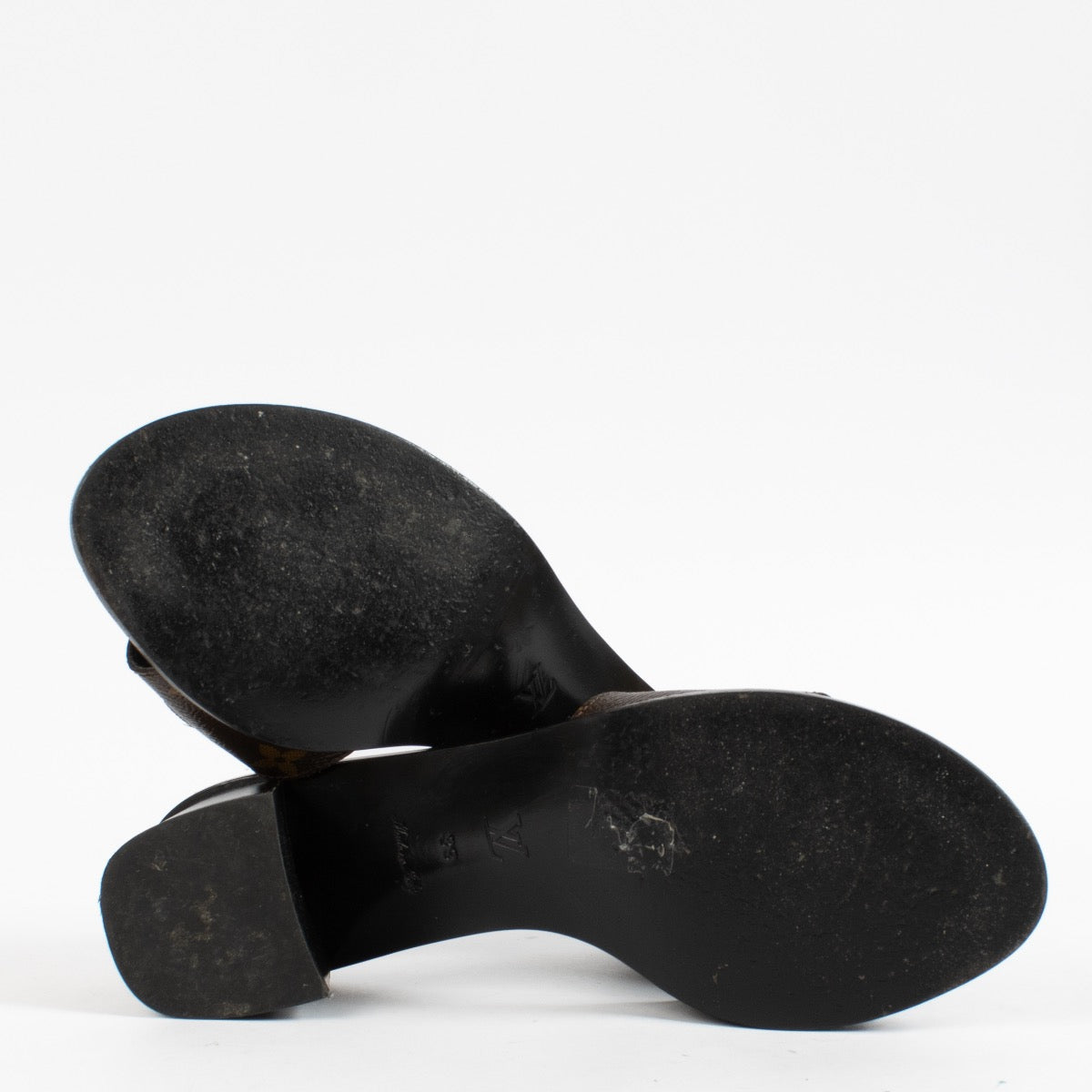 shop 100% authentic second hand Louis Vuitton Monogram Lock It Mule Sandals - Size 39 on Labellov.com