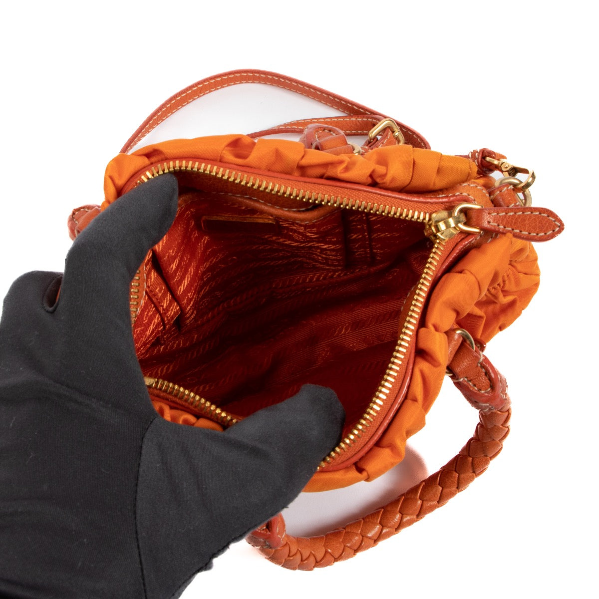 Shop an authentic preloved Prada Orange Tessuto Gaufre Nylon Top Handle on Labellov.com
