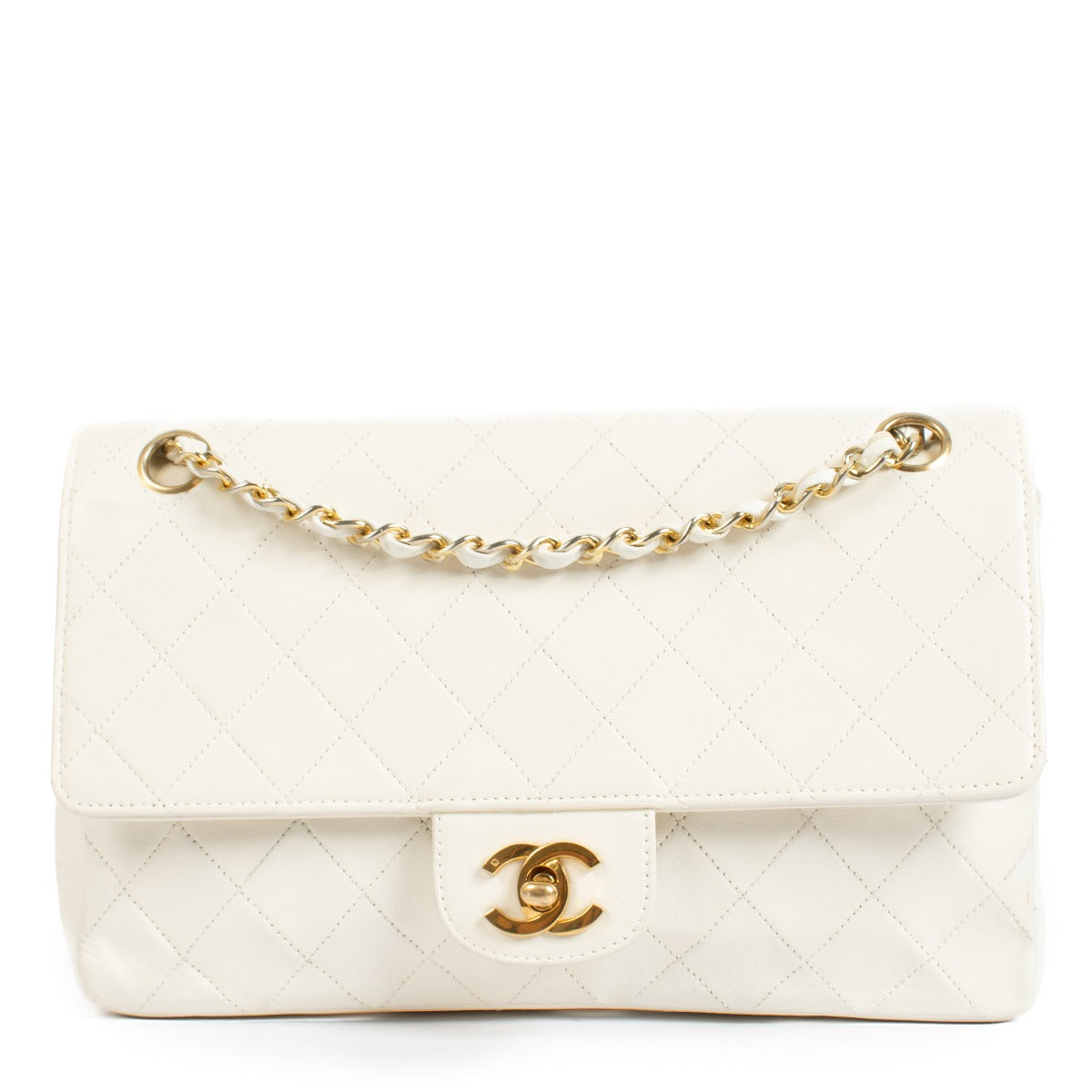 Shop 100% authentic secondhand Chanel White Vintage Medium Classic Handbag on Labellov.com