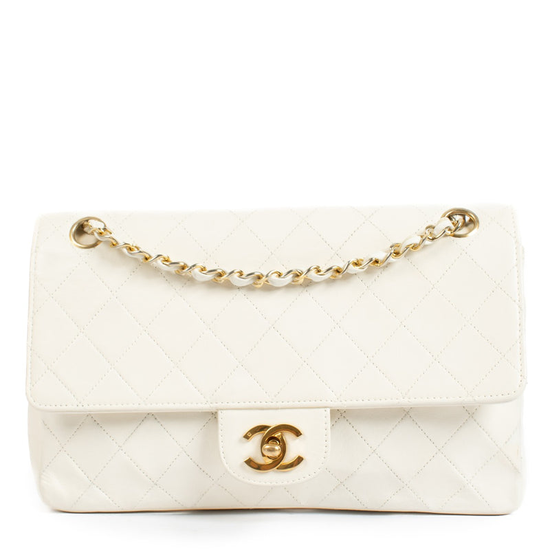 Shop 100% authentic secondhand Chanel White Vintage Medium Classic Handbag on Labellov.com