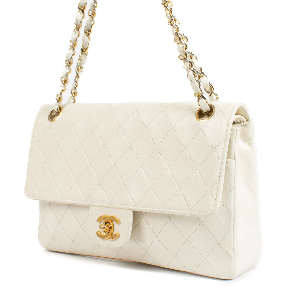 Shop 100% authentic secondhand Chanel White Vintage Medium Classic Handbag on Labellov.com