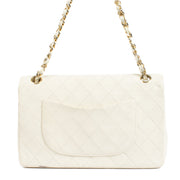 Shop 100% authentic secondhand Chanel White Vintage Medium Classic Handbag on Labellov.com