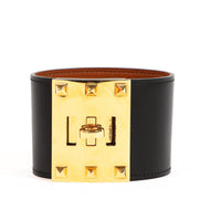 Shop safe online at Labellov in Antwerp, Brussels and Knokke this 100% authentic second hand Hermès Black Swift Leather Kelly Dog Extreme Bracelet - size S