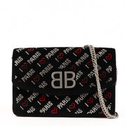 Balenciaga Black Velvet Crystal Love Paris Wallet on Chain for the best price at Labellov secondhand luxury in Antwerp. We buy and sell your authentic designer bags for the best price.
