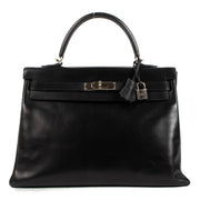 Authentic second hand Hermès Kelly 35 Black Box on www.labellov.com