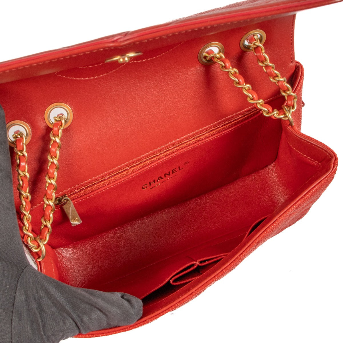 Shop safe online at Labellov in Antwerp, Brussels and Knokke this 100% authentic second hand Chanel Red Caviar Leather CC Filigree Classic Flap Bag