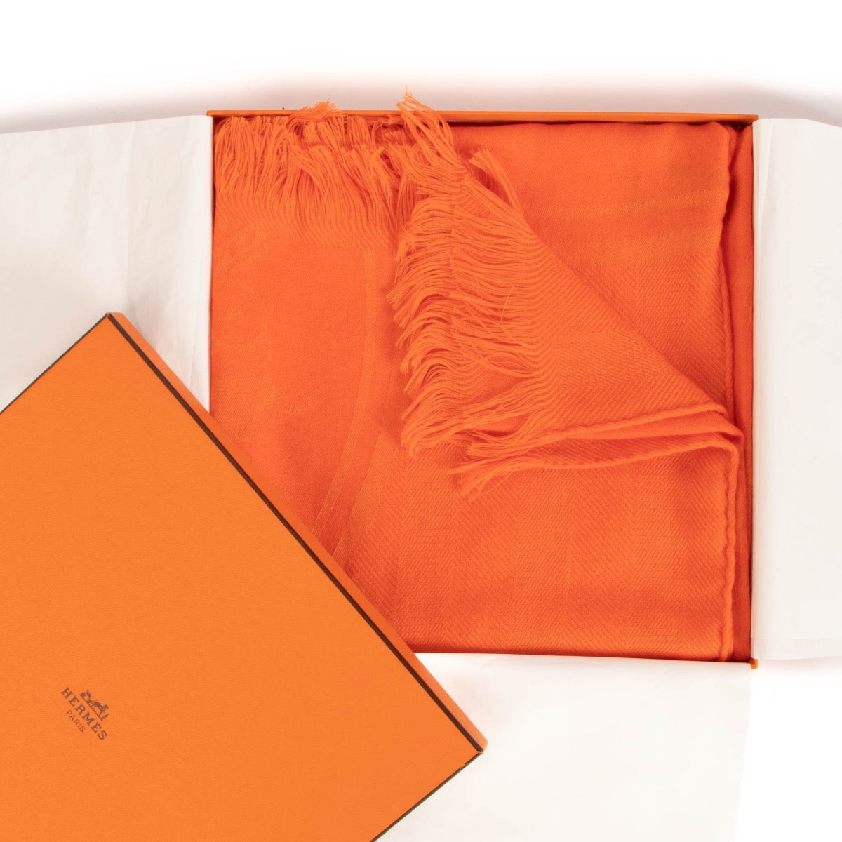 shop 100% authentic second hand Hermès New Libris Orange Cashmere Scarf on Labellov.com