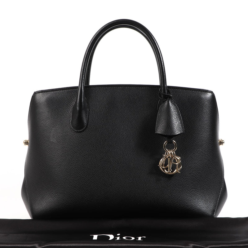 Buy an authentic second hand Christian Dior Black Open Bar Top Handle in very good condition at Labellov