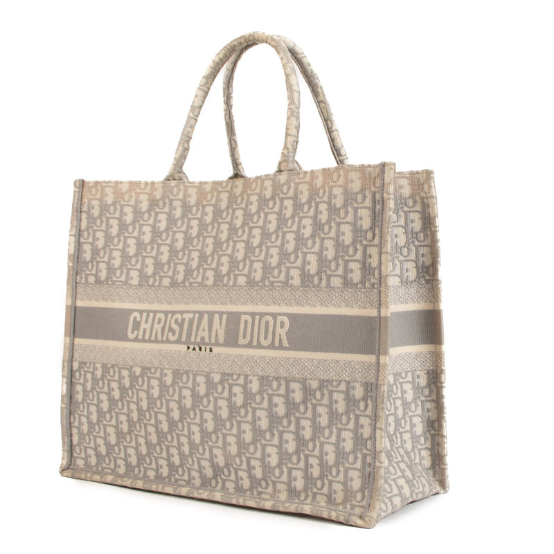 Shop safe online at Labellov in Antwerp, Brussels and Knokke this 100% authentic second hand Christian Dior Light Grey Oblique Large Book Tote