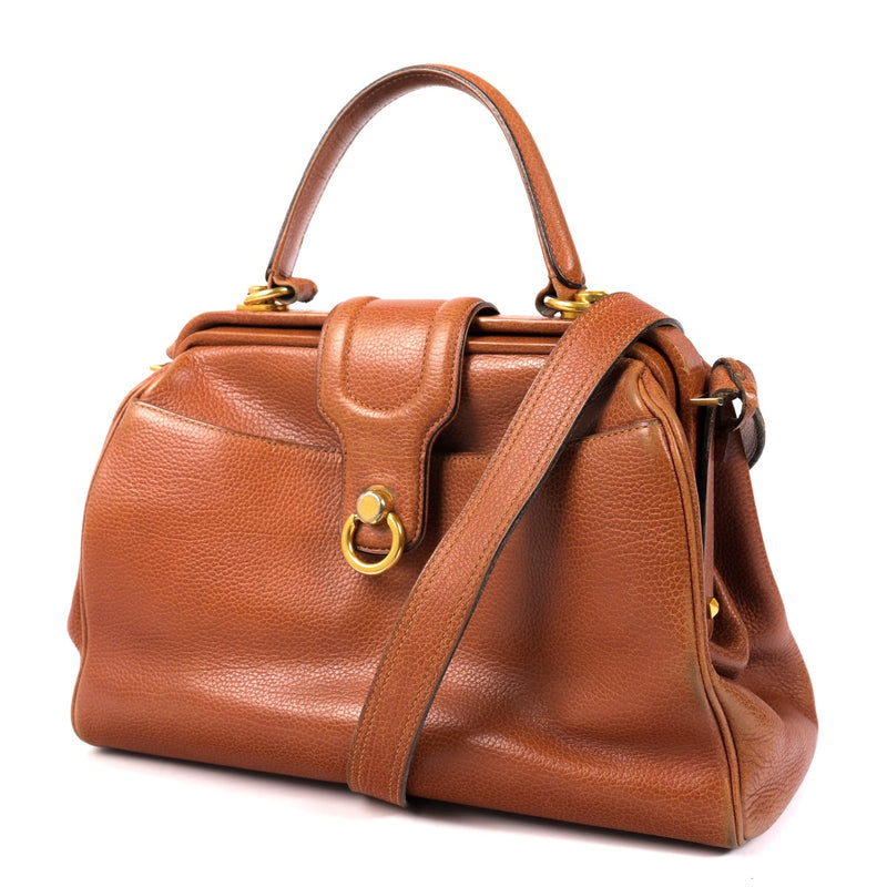 Shop an authentic preloved Delvaux Vintage Cognac Leather Top Handle on Labellov.com