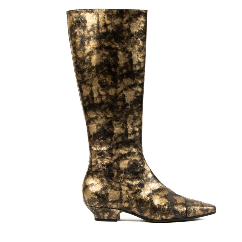 Chanel Gold Laminated Goatskin Riding Boots for the best price at Labellov. We buy and sell your preloved and brand new designer bags for the best price.