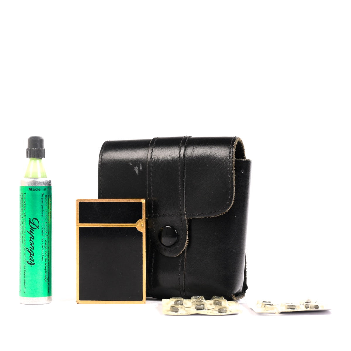 Shop an authentic preloved S.T. Dupont Black Lacquer Gold Vintage Lighter on Labellov.com
