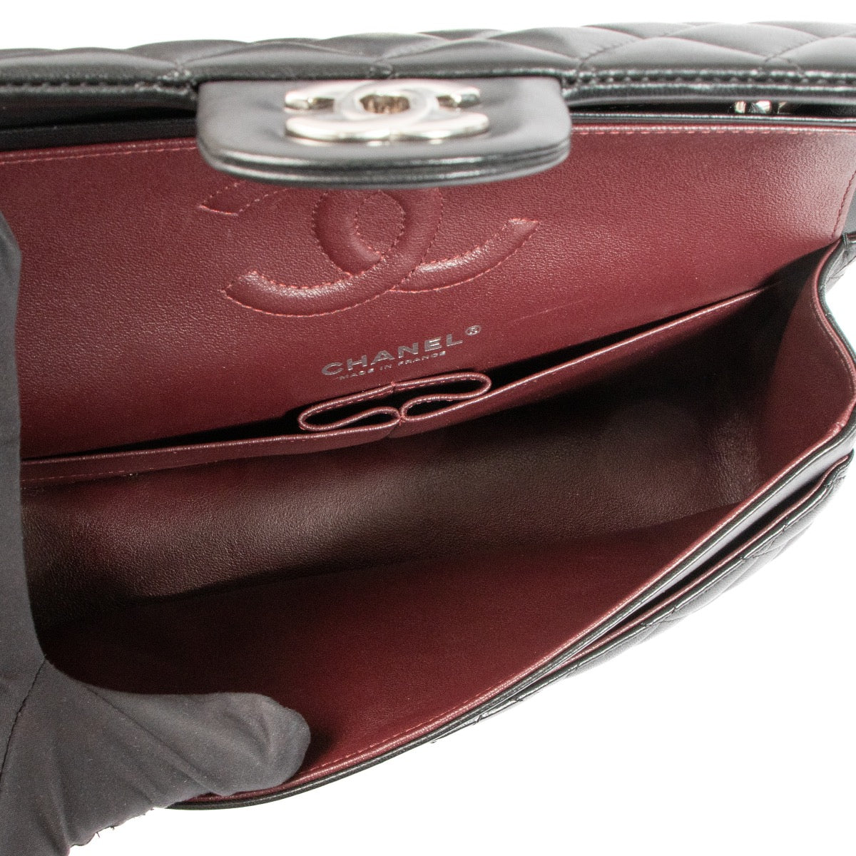 Buy a 100% authentic second hand Chanel Black Lambskin Medium Classic Flap Bag in very good condition at Labellov.com